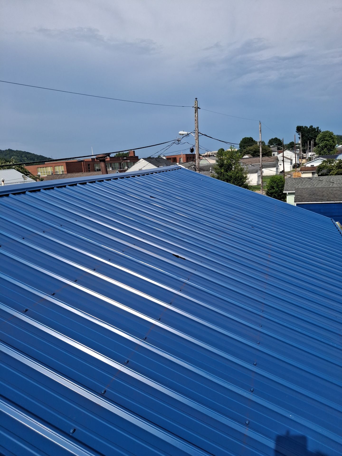 Residential Roofing Installation using Metal by Rainstoppers Roofing