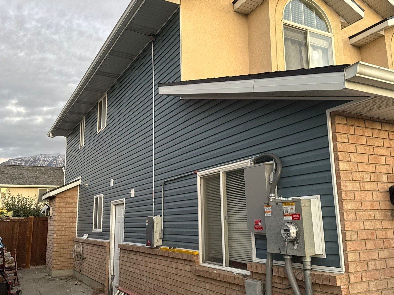Orem | Complete Vinyl Modernization | Bold Nautica & Crisp White by Ideal Siding Utah