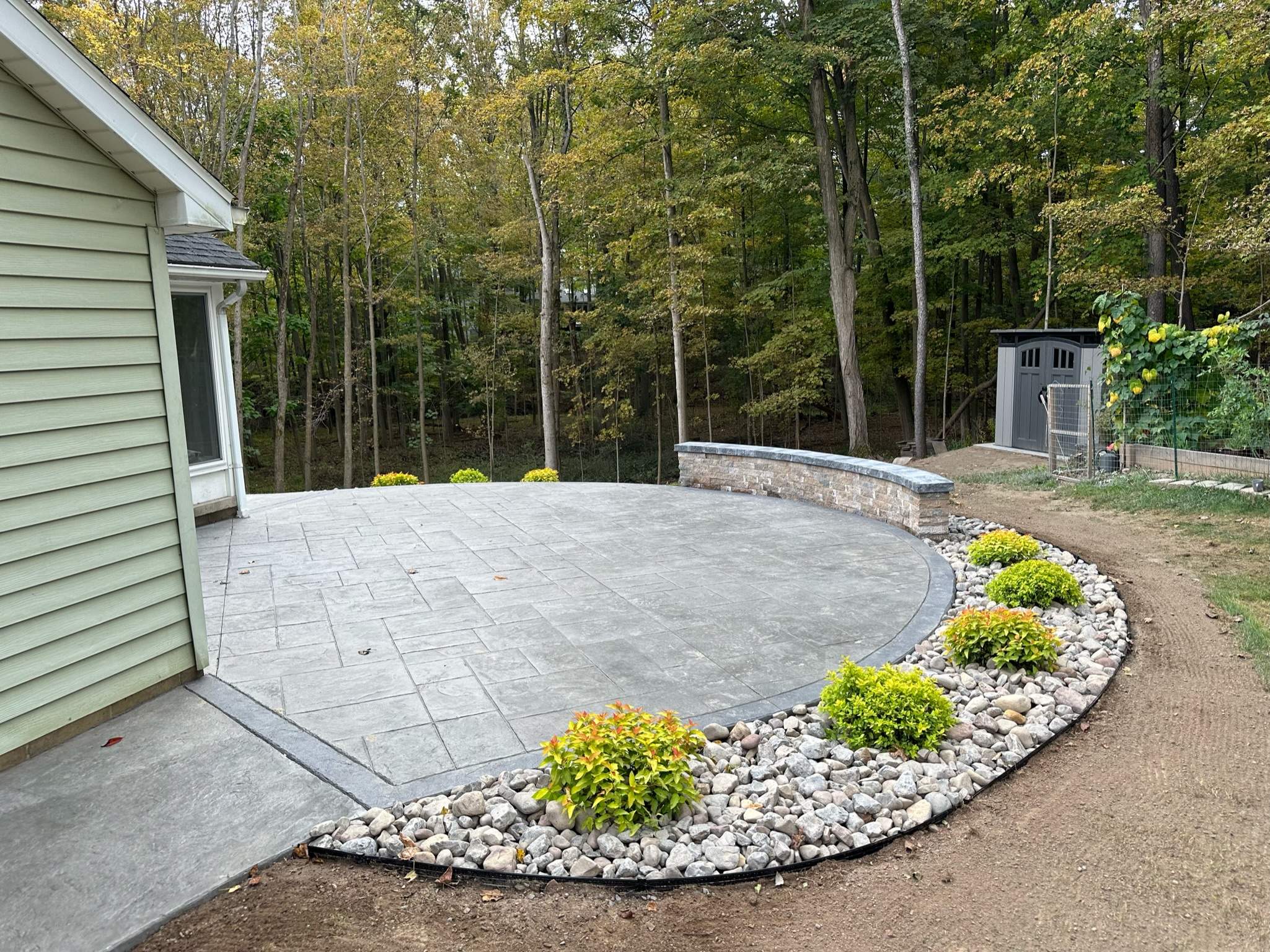 Majestic Ashlar stamped concrete patio by NG Masonry & Construction LLC