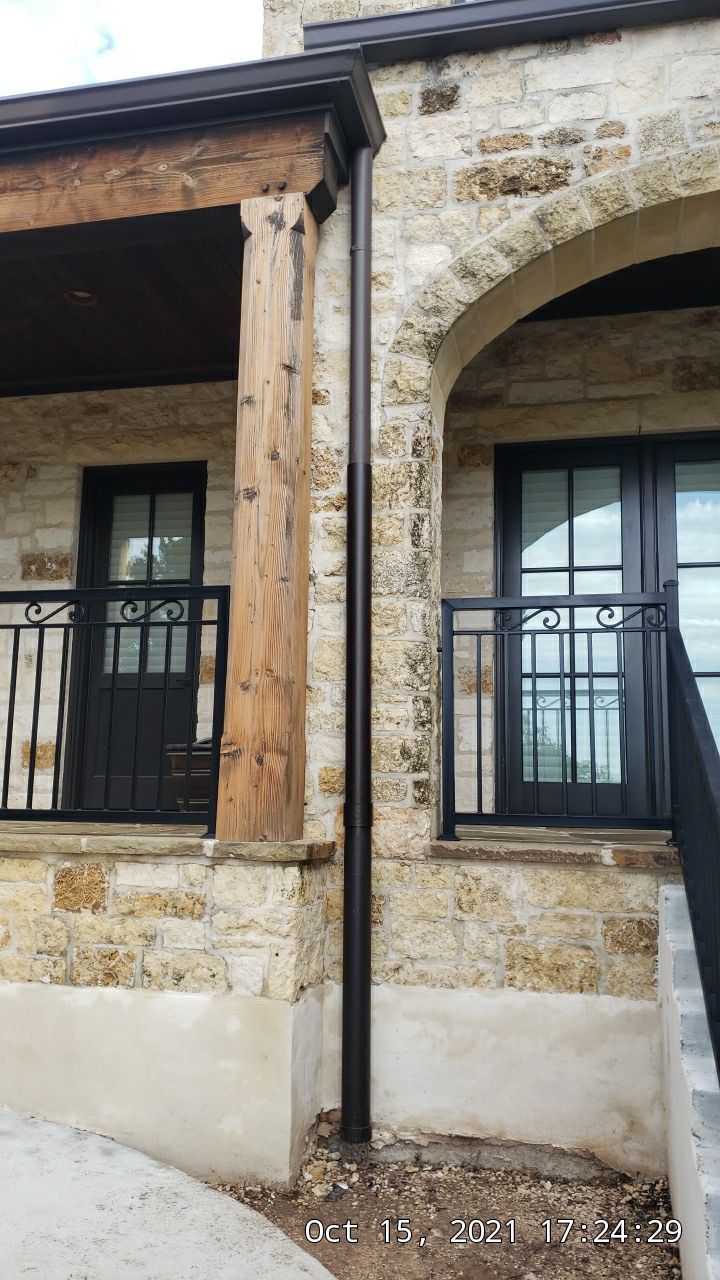 Cliffside installation for primary water source. by Hill Country Rain Water