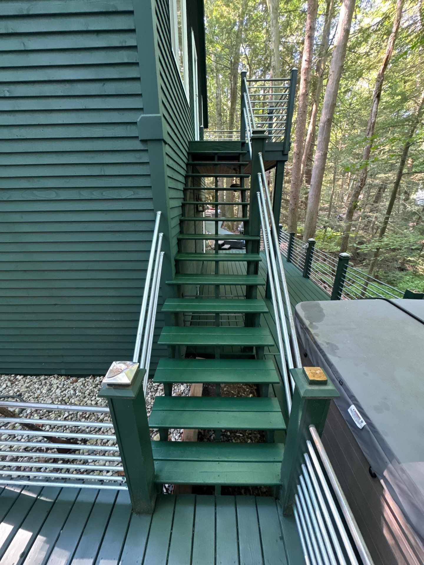 Solid staining decking and stairs. by Gordon Painting