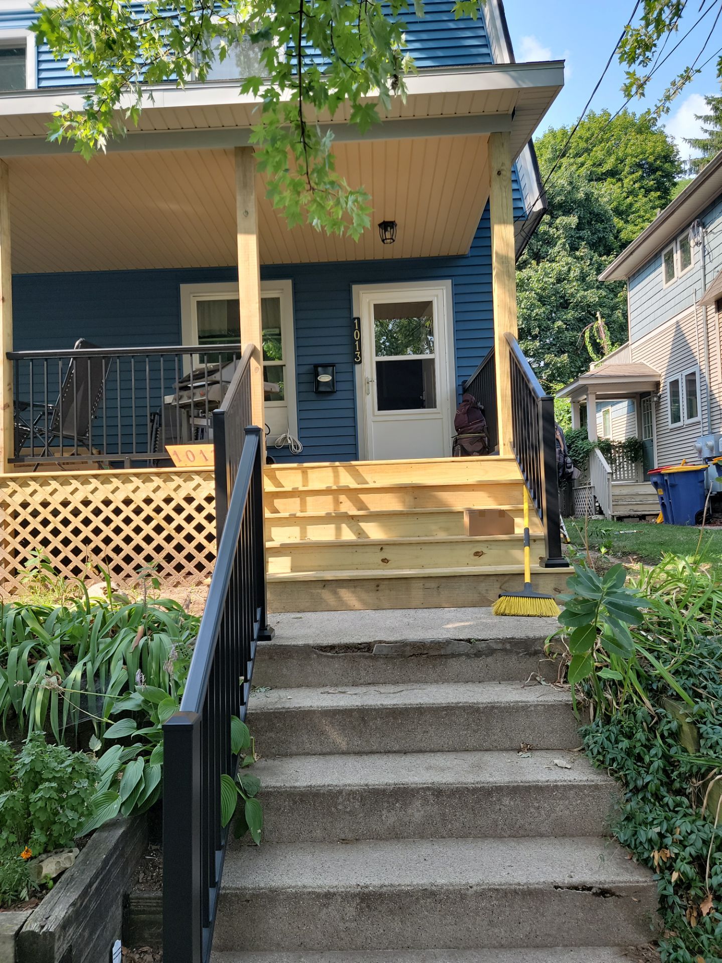 SIDING, DECK AND NEW PORCH  by Avalon Roofing and Exteriors