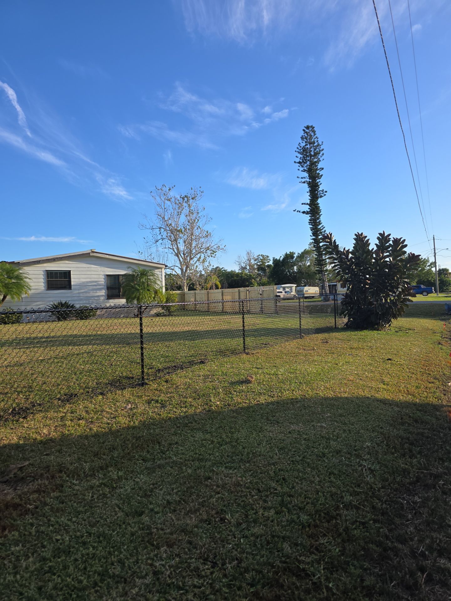 Wood and Chain Link Fence in Port Charlotte by True Fence LLC