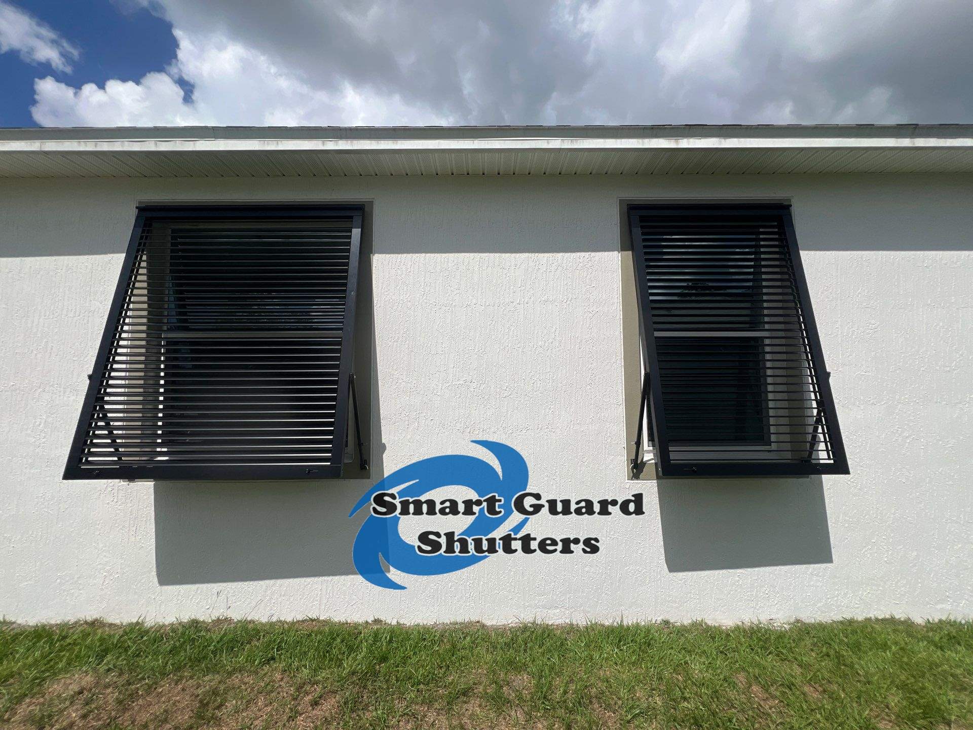 Impact Rated Bahama Shutters in Matte Jet Black by Smart Guard Shutters