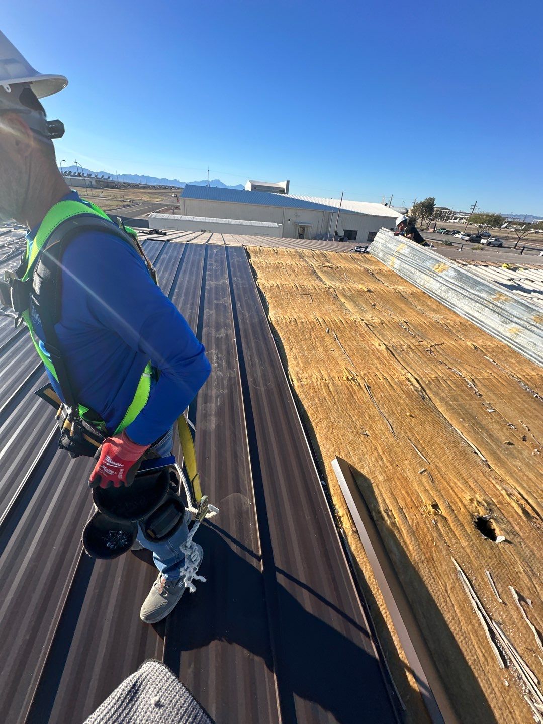 Burnished Exposed Fastener by Reimagine Roofing