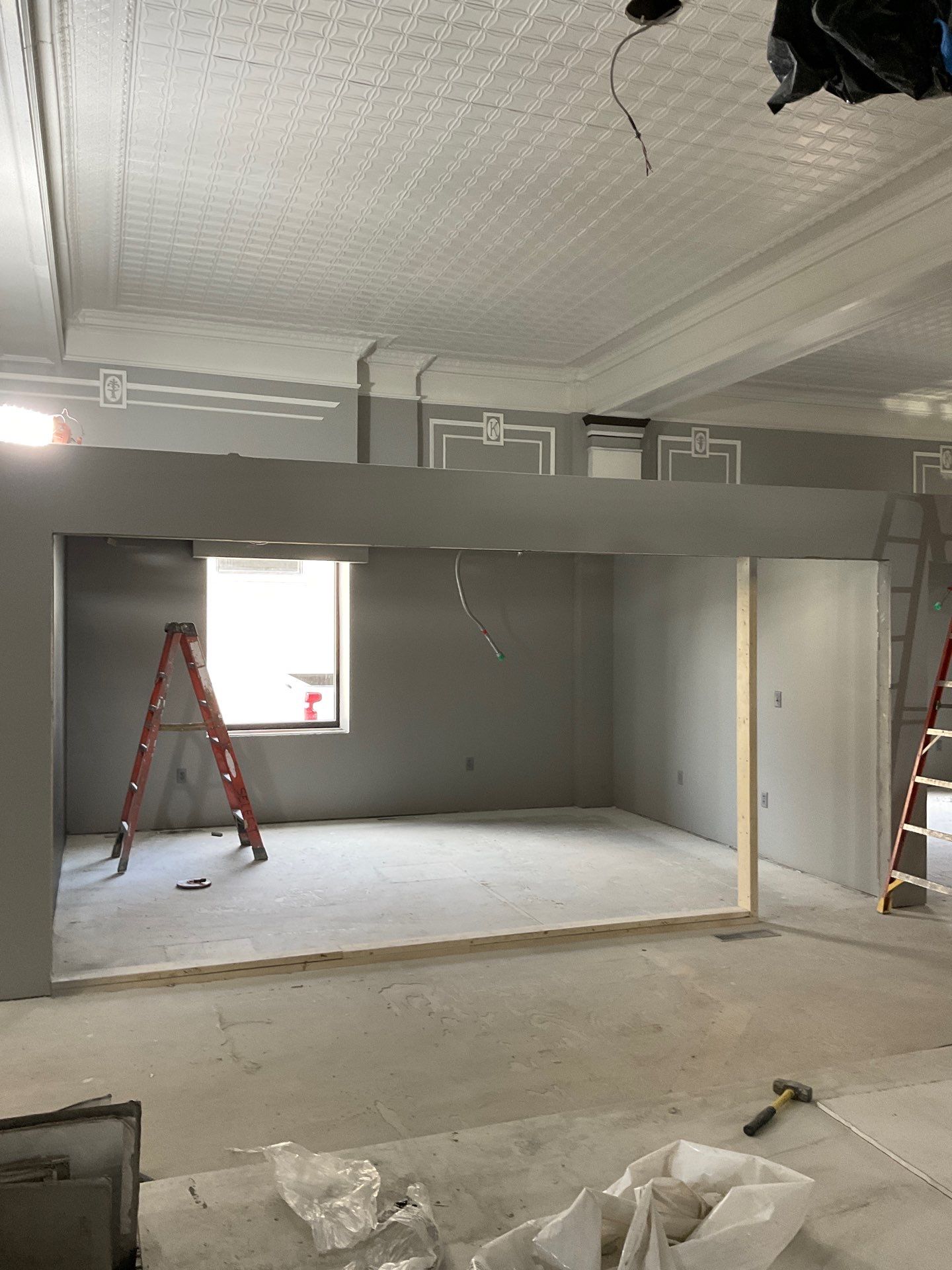 Commercial Interior Remodel for Dacotah Bank Featuring Decorative Tin Ceilings by Select Painting, Coatings & Garage Cabinets