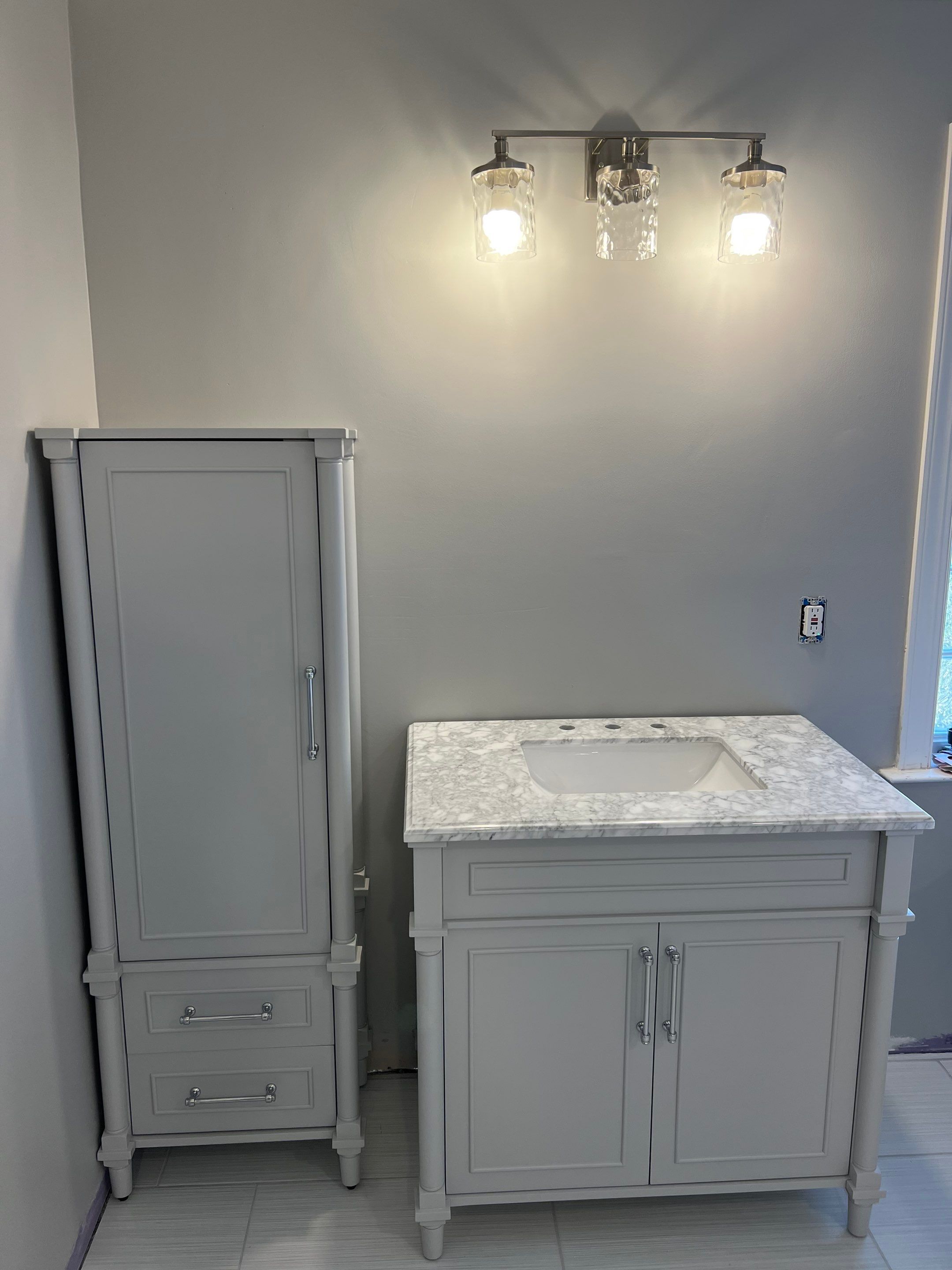 Bathroom Remodel using Schluter by Footprints Floors of Coastal Carolina