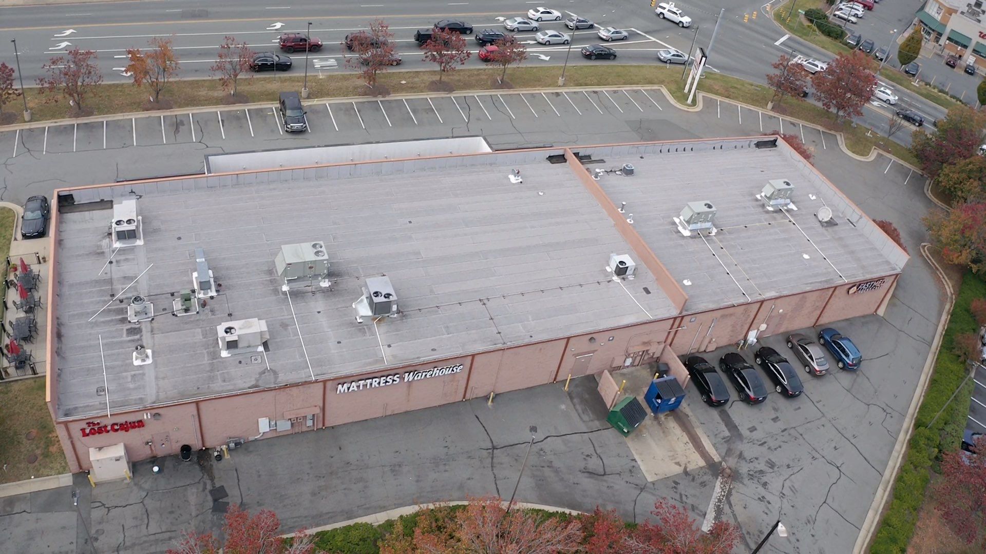Commercial Coating using Poly Urerthane and Silicone Coating by Just In Time Roofing and Restoration