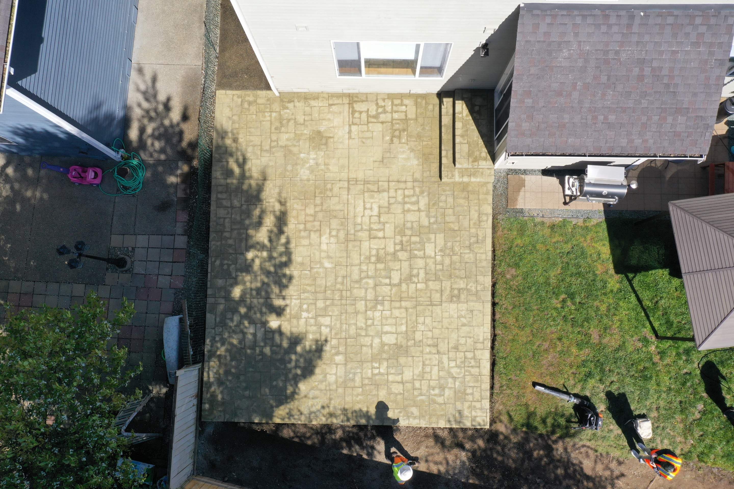 Benedict | Stamped Concrete Back Patio by Jireh Asphalt & Concrete Inc 