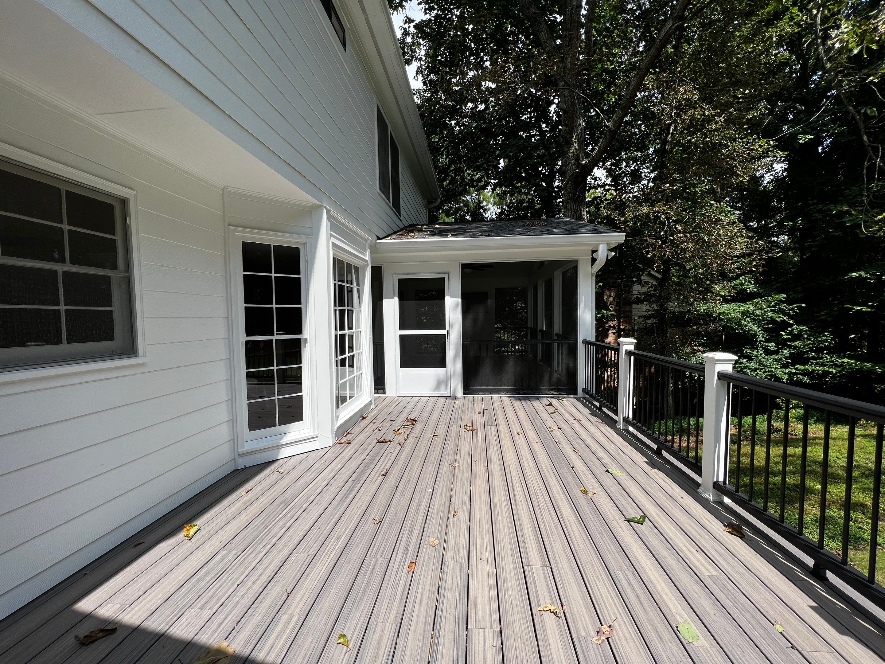 Elevated Composite Deck and Screened Porch Construction in Duluth by Swift Home Renovations 