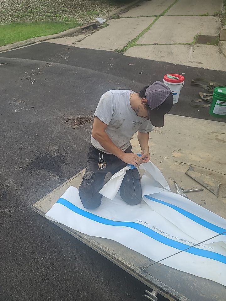 Sewer Repair using Perma-Liner through two manholes by Sureway Comfort John Wilcox Plumbing Heating Cooling