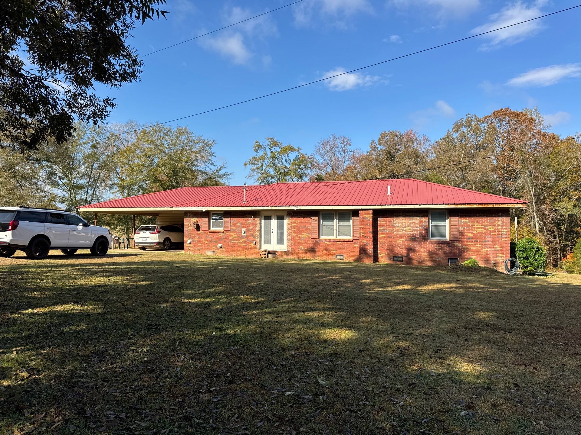 White Masonry Painting and Exterior Home Refresh in Covington by PGP Surface Solutions, LLC