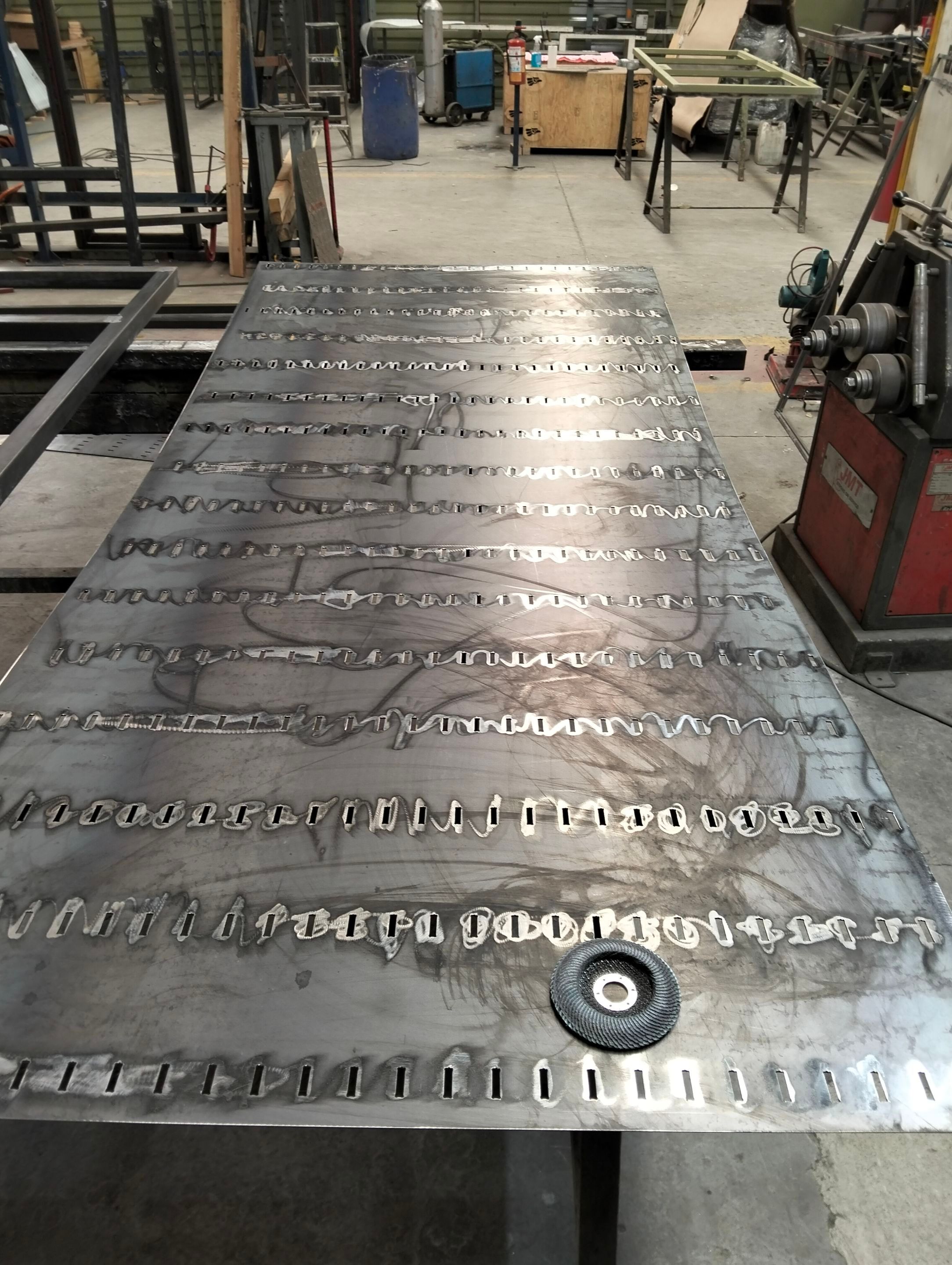 Custom Steel Oporto Pivot Door Installation for Dallas New Construction by Solara Custom Living