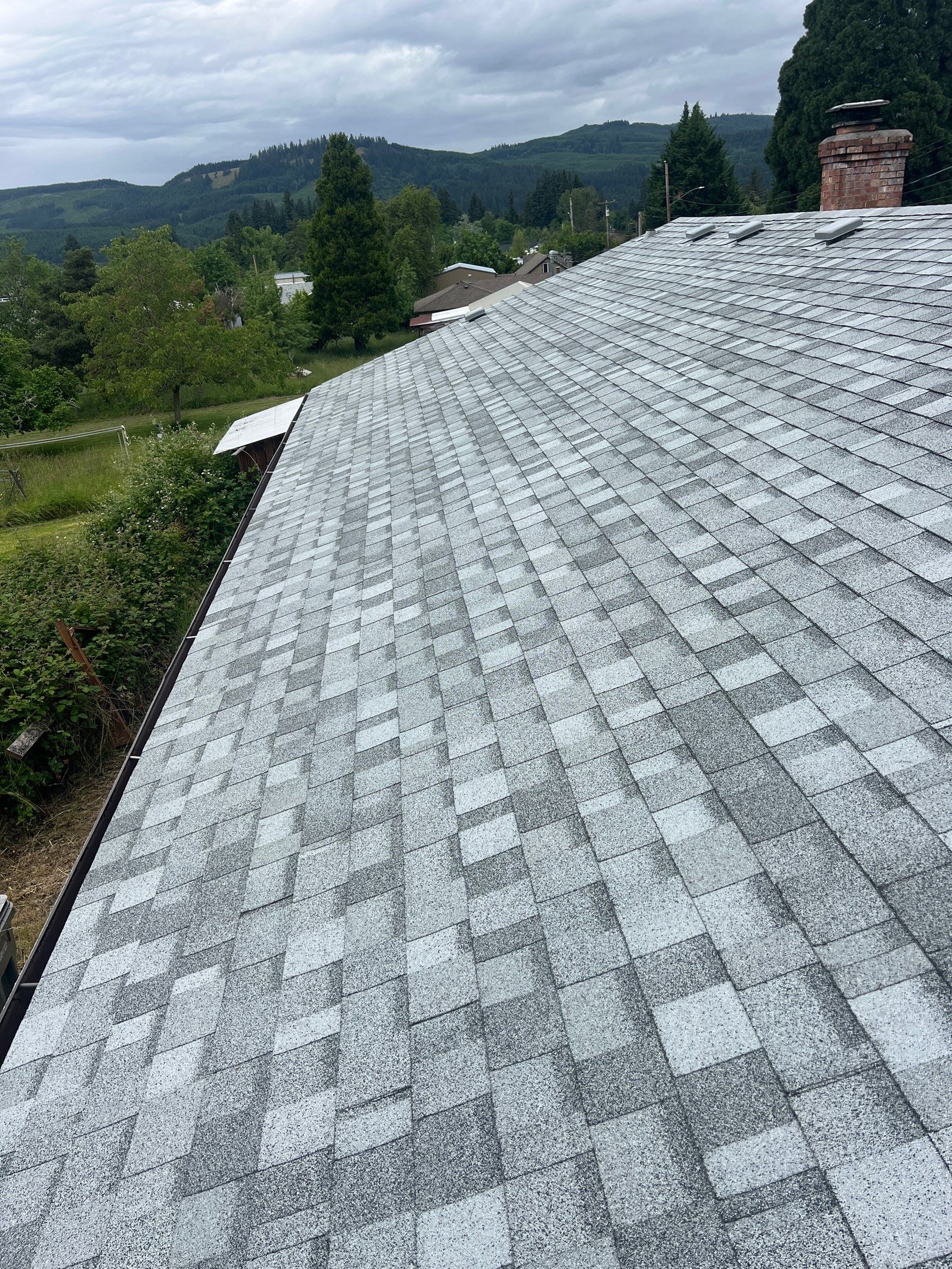 Residential Roofing Installation using IKO Dynasty (Color: Frostone Grey) by Orezona Building & Roofing Company, Inc.