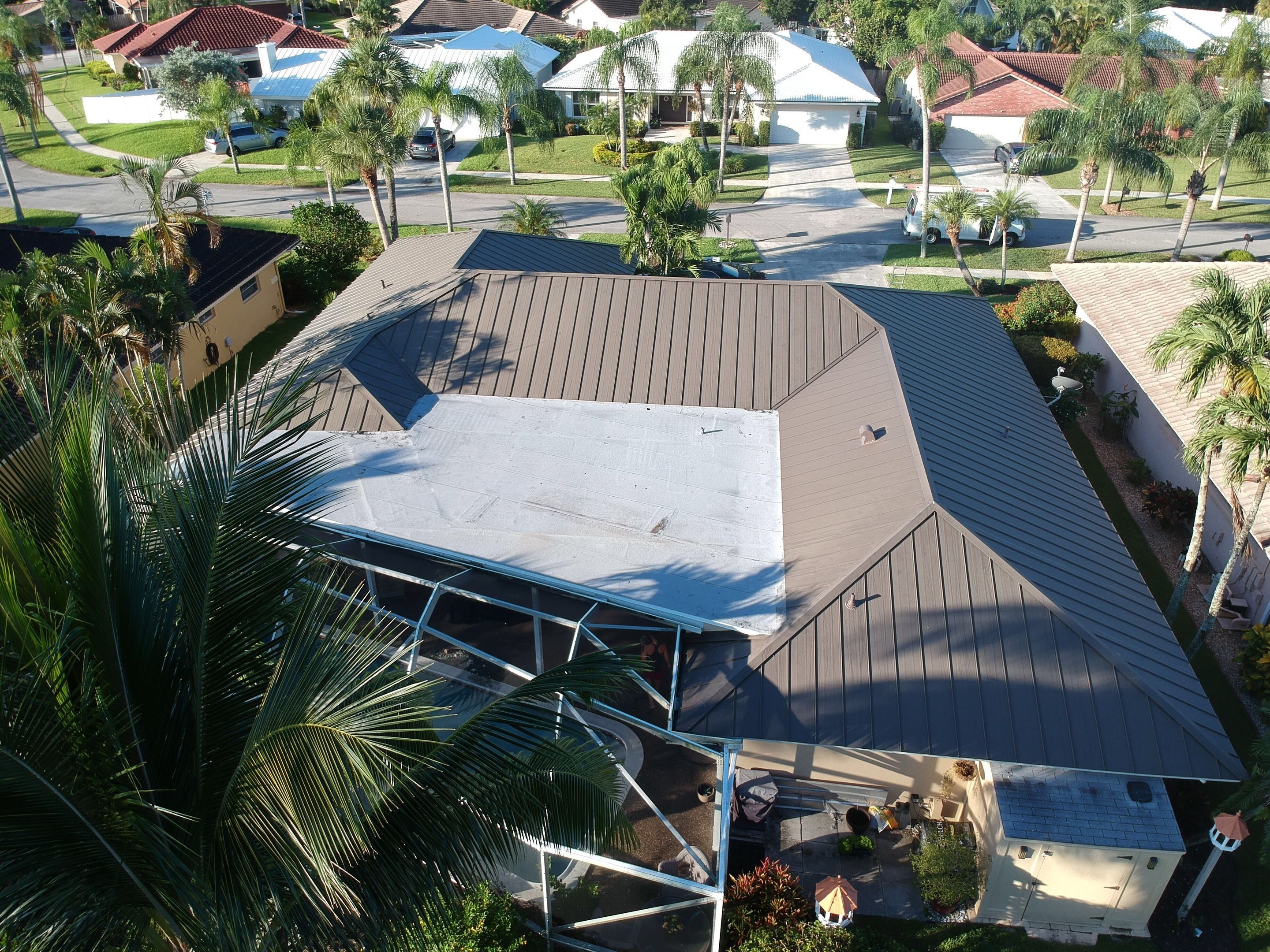 Residential Roofing Installation using 1" Nail strip metal roof by BLUES BROTHERS CONSTRUCTION CORP