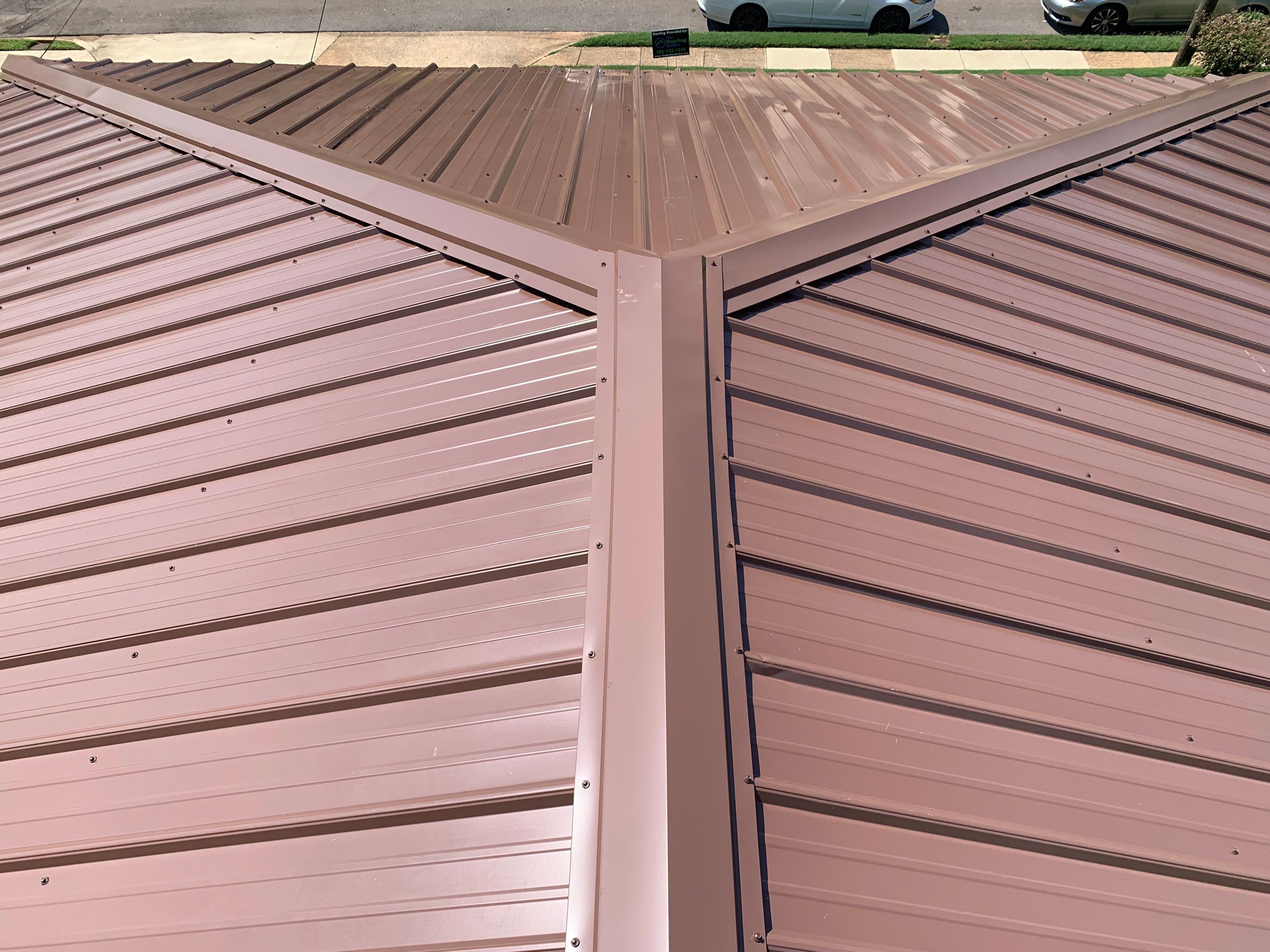 Residential Roofing Installation using 26 Gauge Metal by The Roofing Dudes