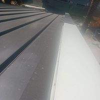 .032 Aluminum 1.5" Mechanical Seam Dark Bronze by Total Roofing System The Metal Roof Experts