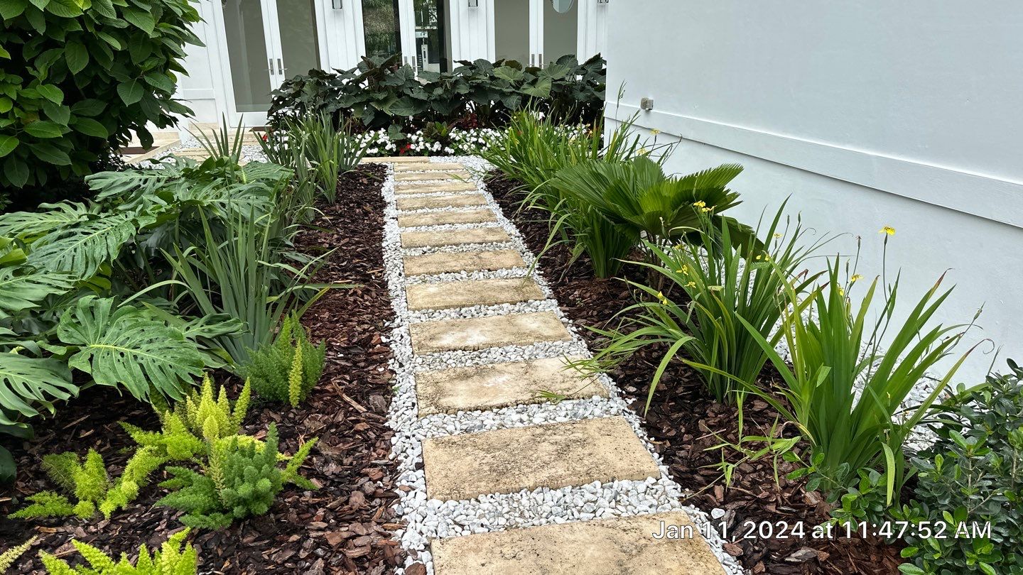 Backyard Landscape Renovation by Nature's Dream Landscape and Tree Service