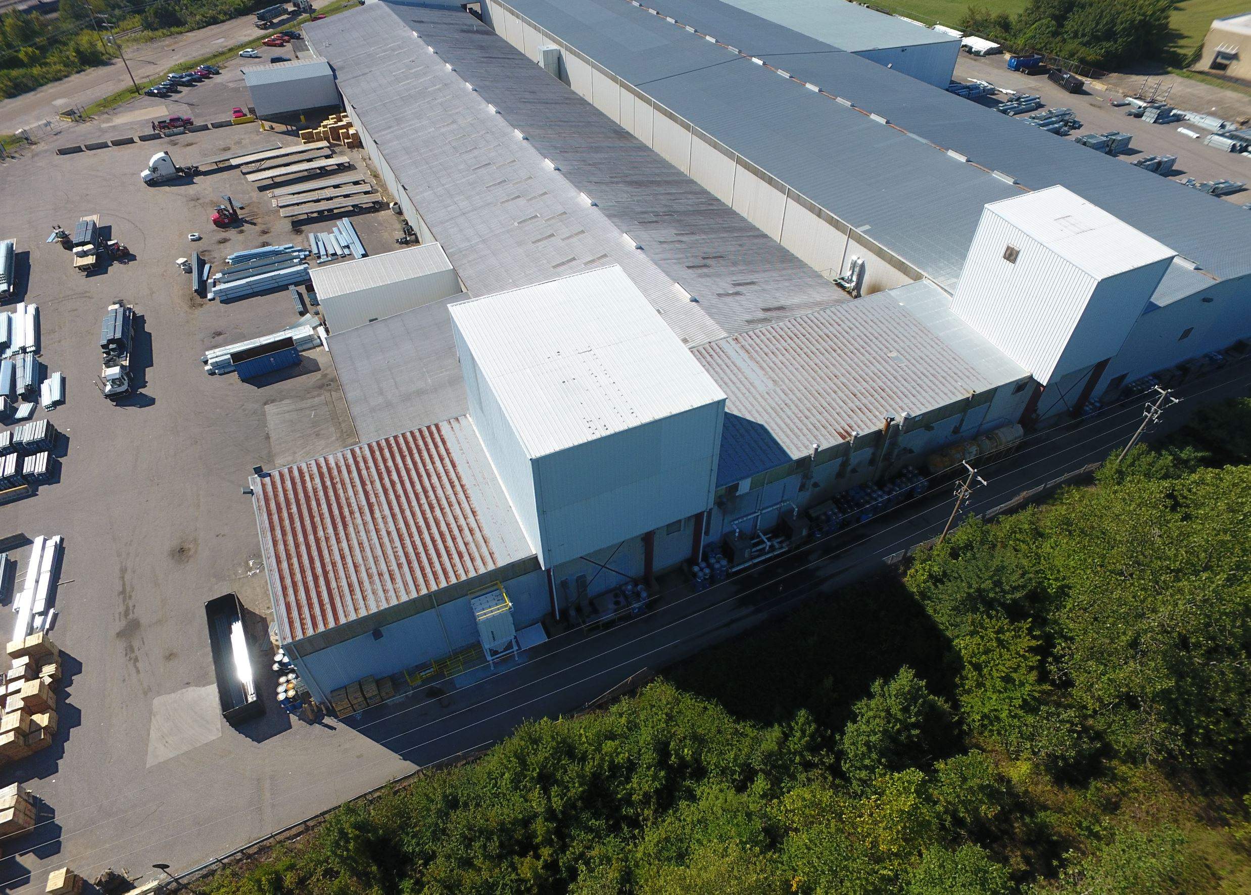 Commercial Metal Restoration System using Aldocoat Coatings by Hostetler Roofing