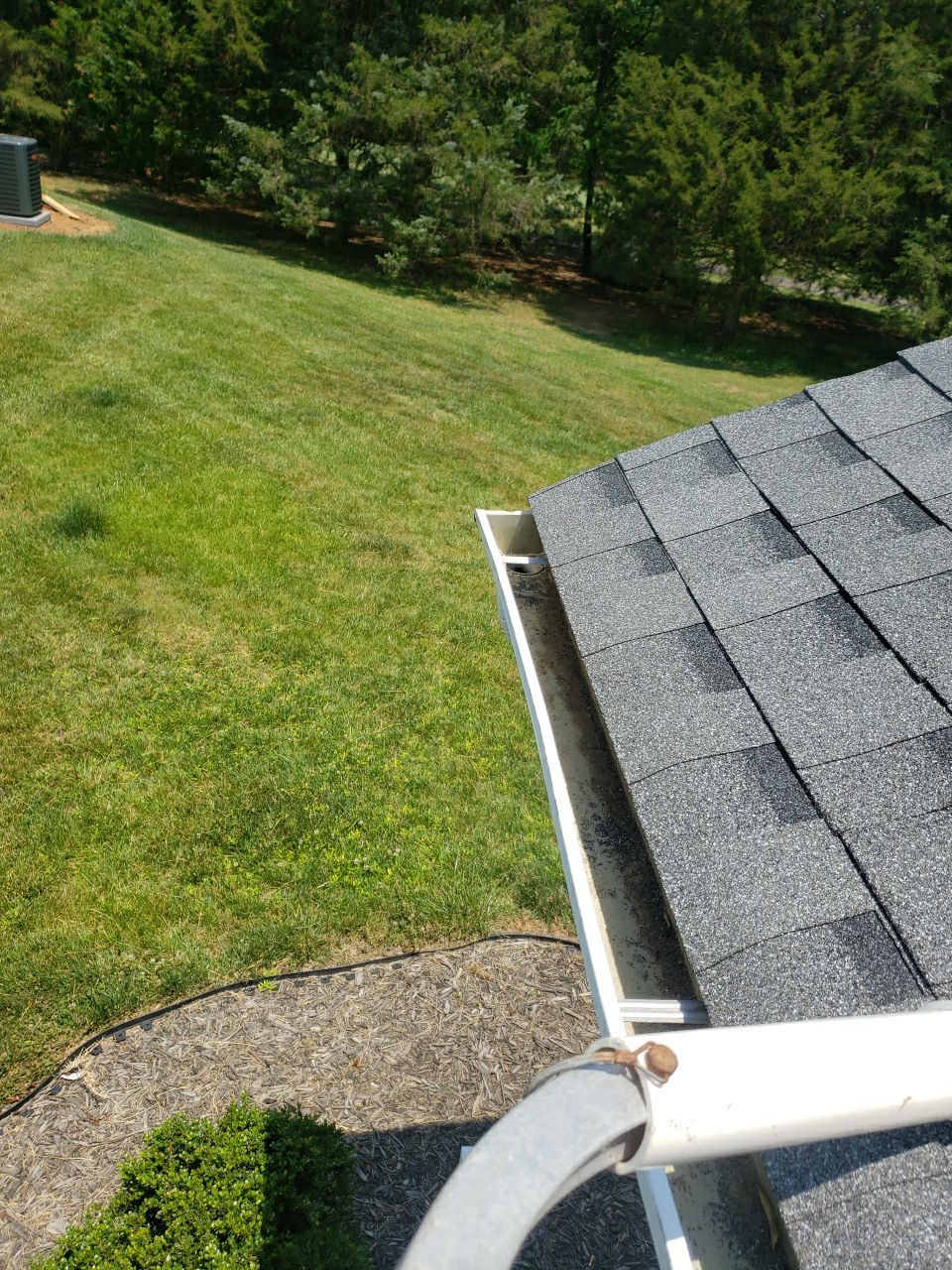 Gutter Cleaning using water by Power Wash Masters LLC