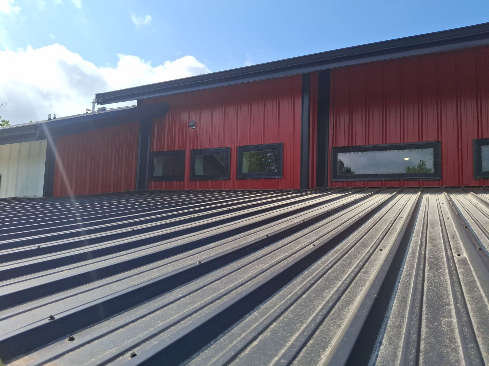 A Fresh Sunroom Roof in Flint, TX! by Quality Coats Painting