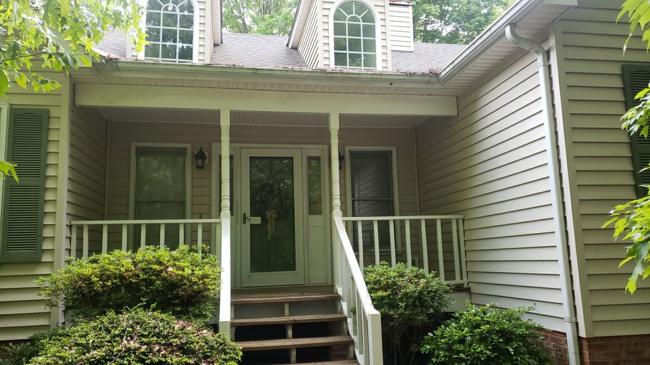 House Wash using cleaner by Power Wash Masters LLC