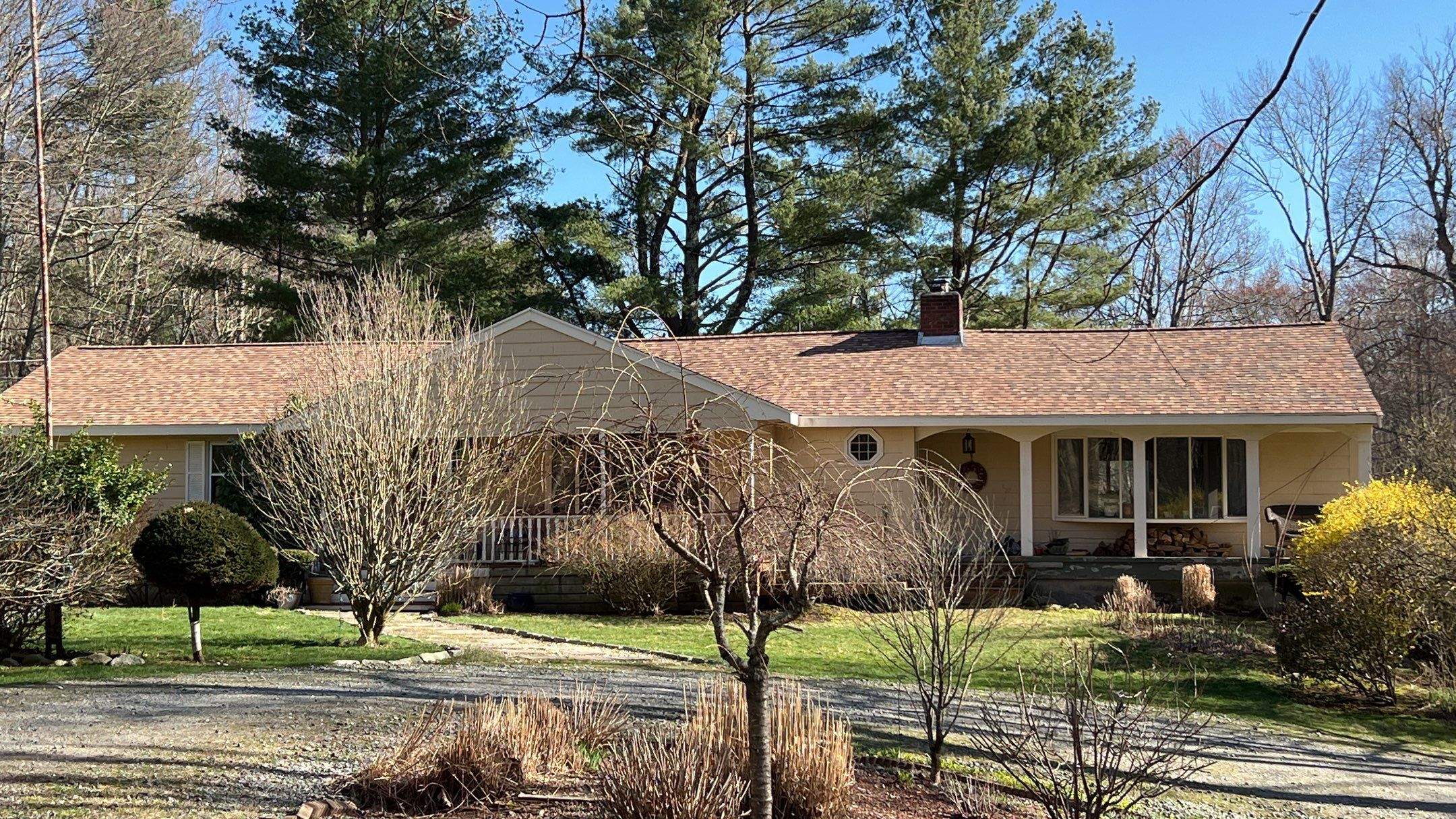 Burnt Sienna Roofs by Pinnacle Roofing & Skylights