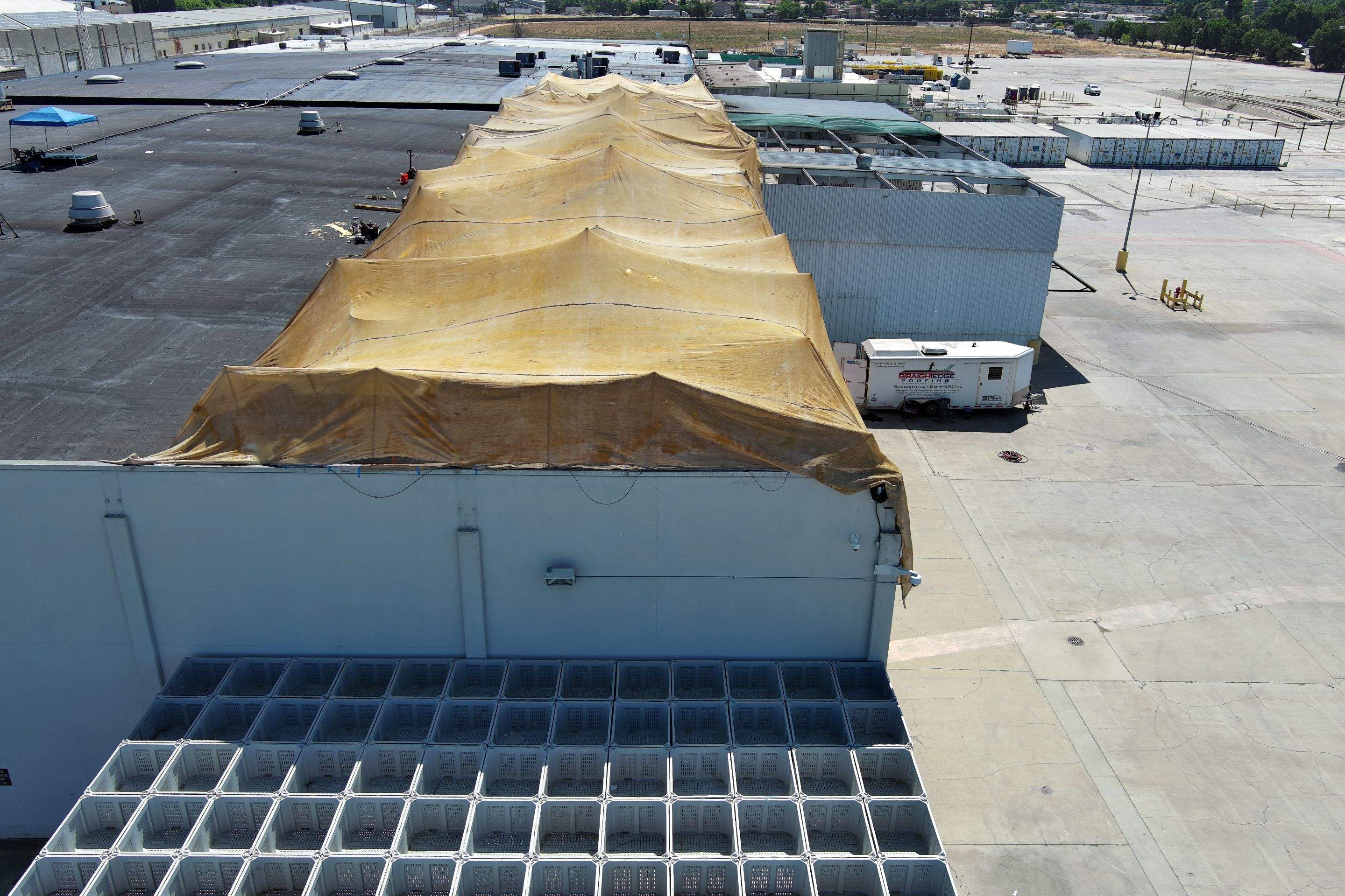 Pro Farms Spray foam roofing project by Straight Edge Roofing Inc
