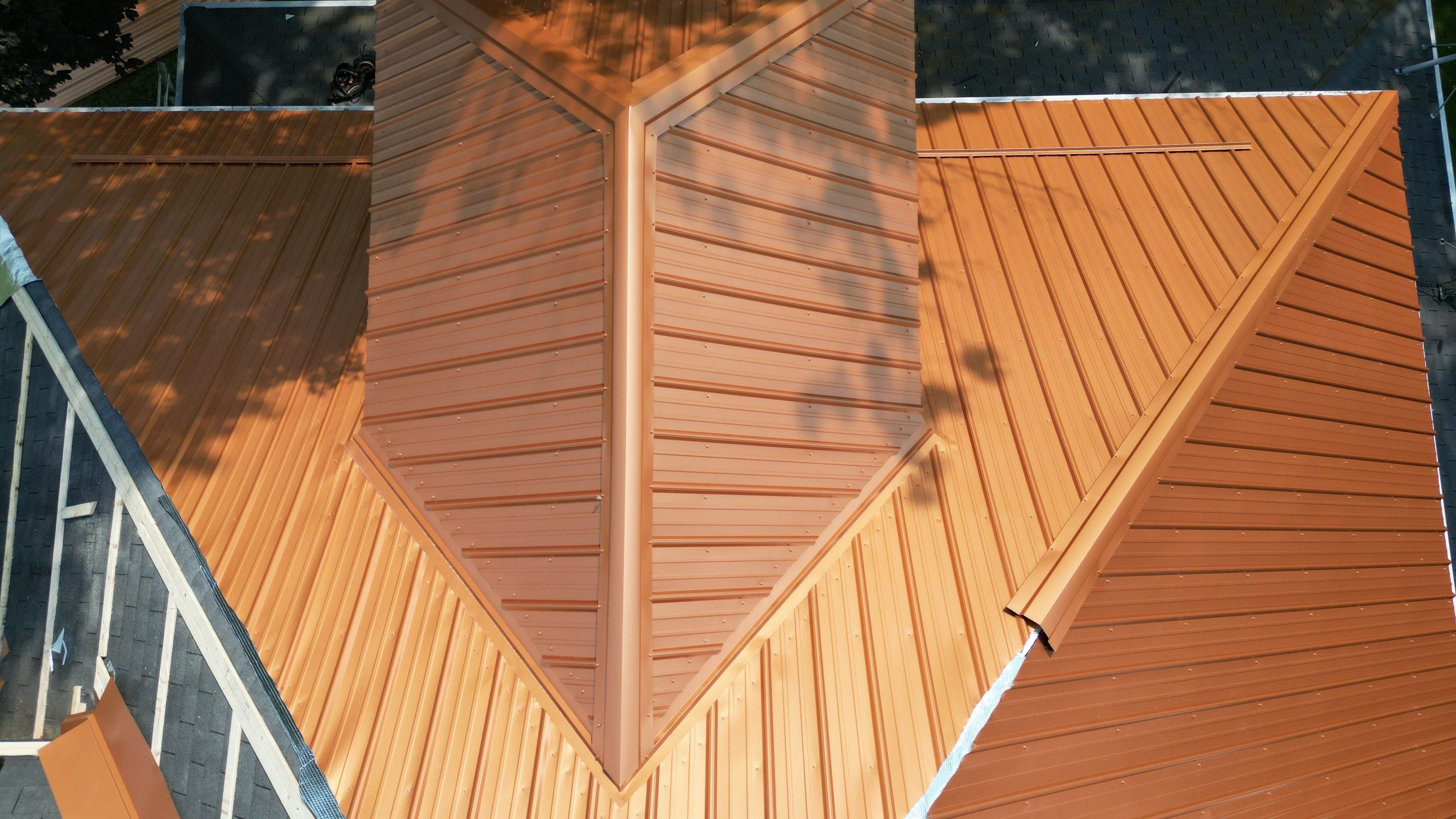 Residential Roofing Installation using Performance Panel Metal - Copper Metallic by RoofX 