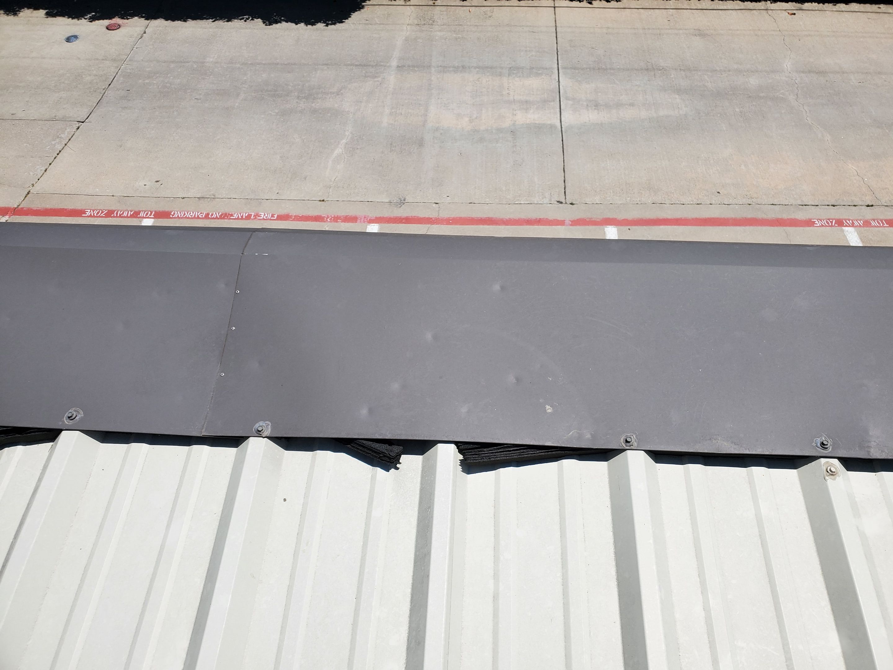 Commercial Roofing Installation using Double lock Mechanical Standing Seam Metal by Becker Roofing and Exteriors
