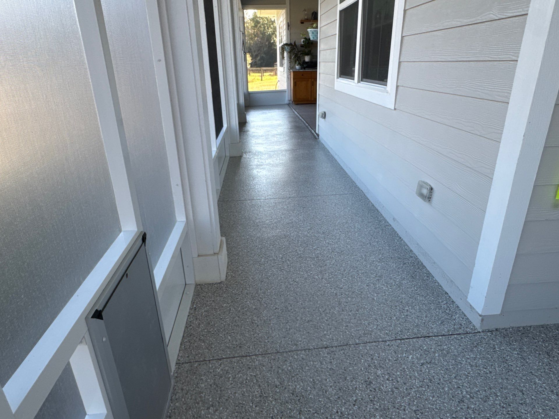 Front and Back Porches  in Micanopy, FL (Front Porch: Slate Stone, Back Porch: Mount Everest) by Cross Creek Concrete Coatings