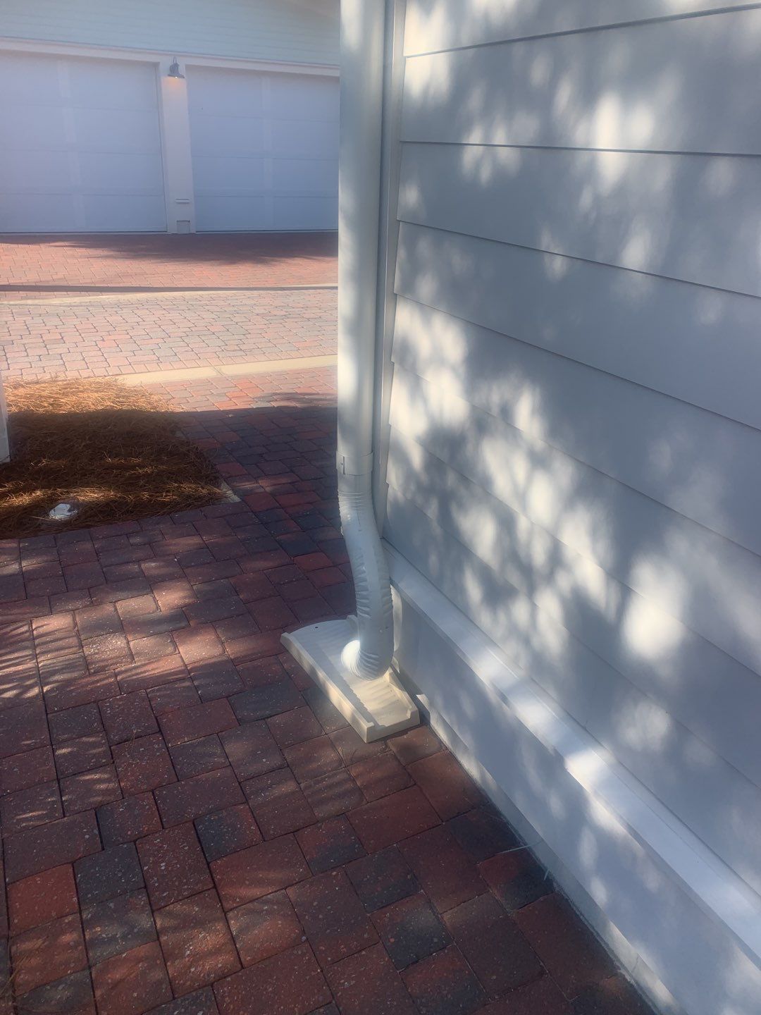 White Half-Round Gutters Installation in Rosemary Beach, FL by Gutter Professors