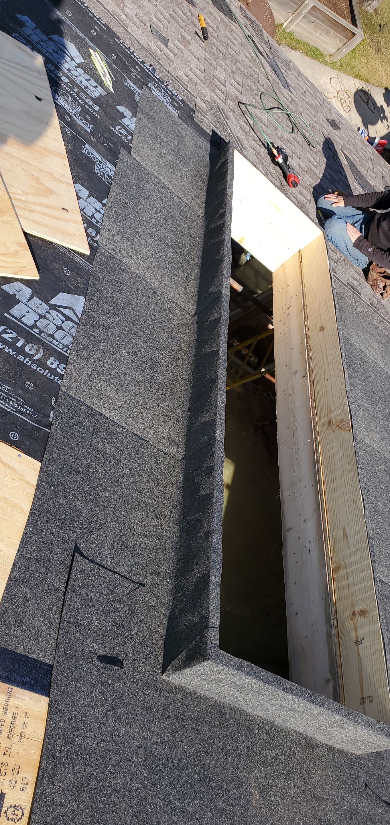 Skylight removal and install  by Absolute Roofing and Construction