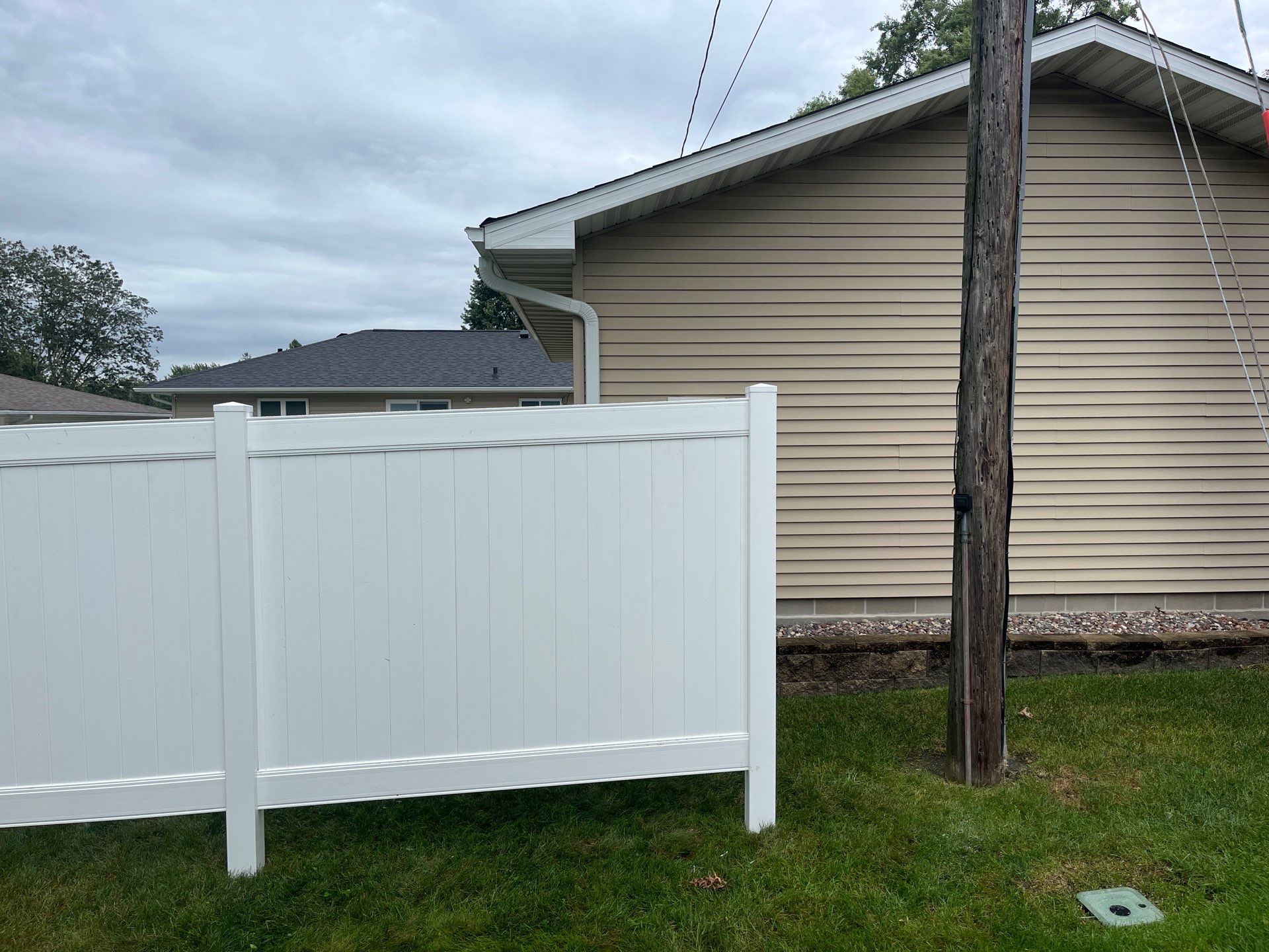 Residential White Vinyl Privacy Fence Enclosure in Waterloo by Perfect Picket Fence and Stain