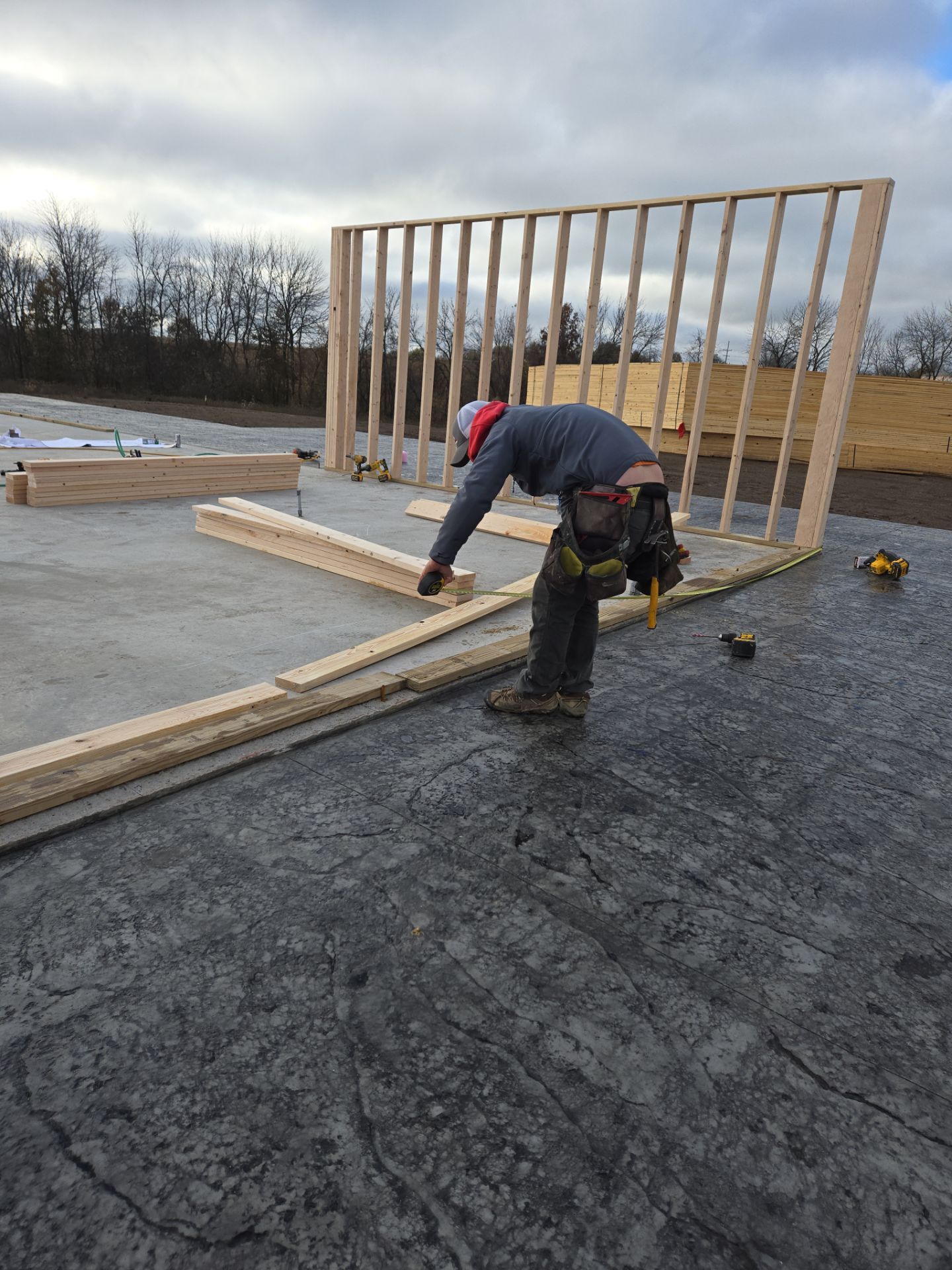 New Home construction w/ board and batten sides and metal roof  by Miles Construction 