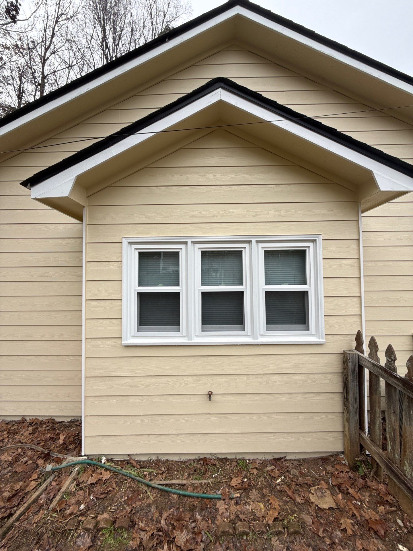 Norcross Exterior Remodel With New Lap Siding and Window Installation by Swift Home Renovations