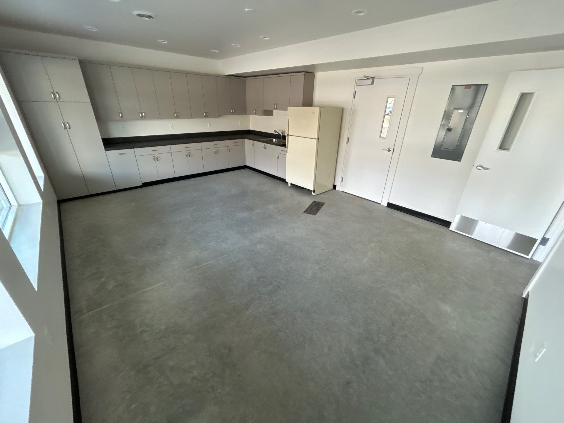 Colfax Commercial Shop Transformation With Vapor Mitigating Floor Coatings by Croc Coatings, LLC