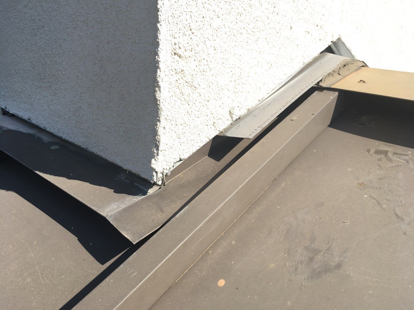 Spray foam and coatings inside commercial building HVAC well using Spray foam and coatings over existing BUR system by Straight Edge Roofing Inc