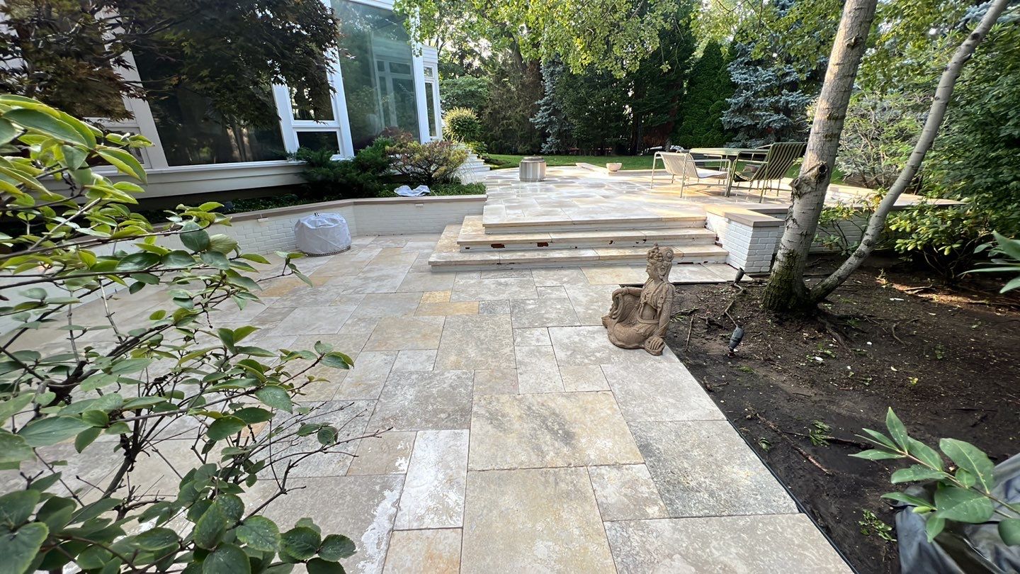 marble patio cleaning and sanding using Polysweep polymeric sand by Northern Power Washing LLC.