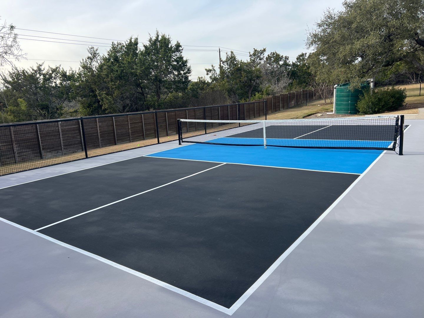 Custom Backyard Pickleball Court in Austin by Sport Court Austin
