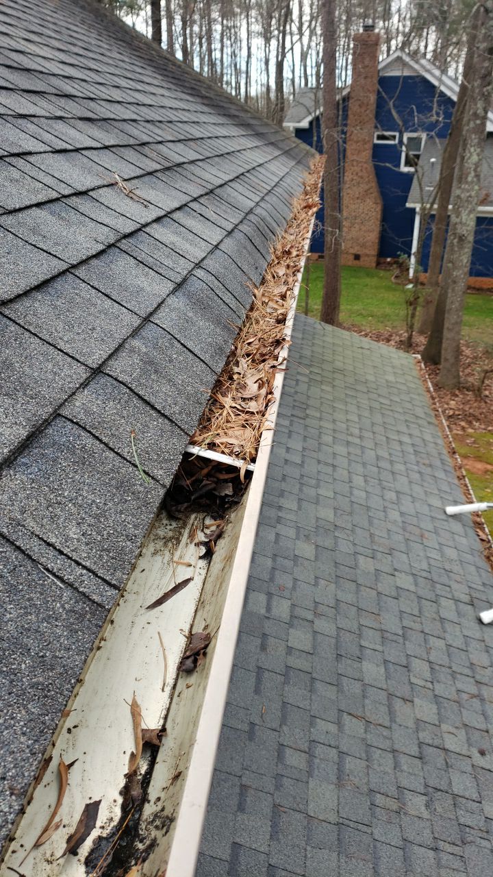 Gutter Cleaning using water by Power Wash Masters LLC