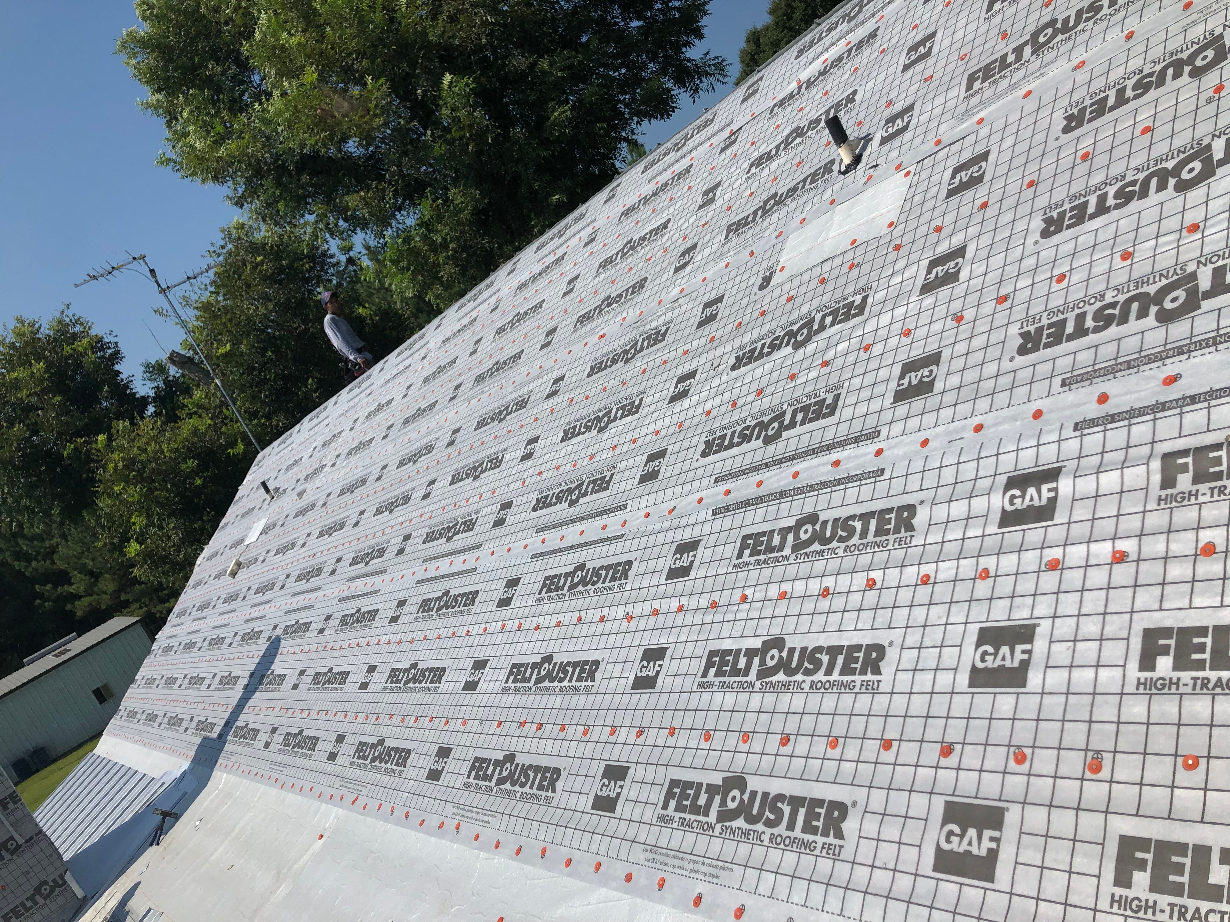 Residential Roofing Installation using Metal roofing by American Roofing & Construction LLC