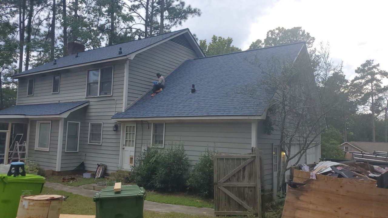 Residential Roofing and Porch Rebuild using Owens Corning Duration Shingles by Indigo State Roofing