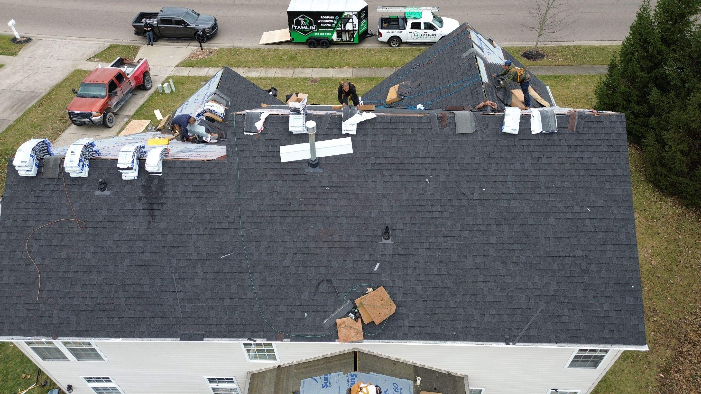 Walden Ponds - Pristine Black and Hydro Flo Gutter Guards by Tamlin Roofing