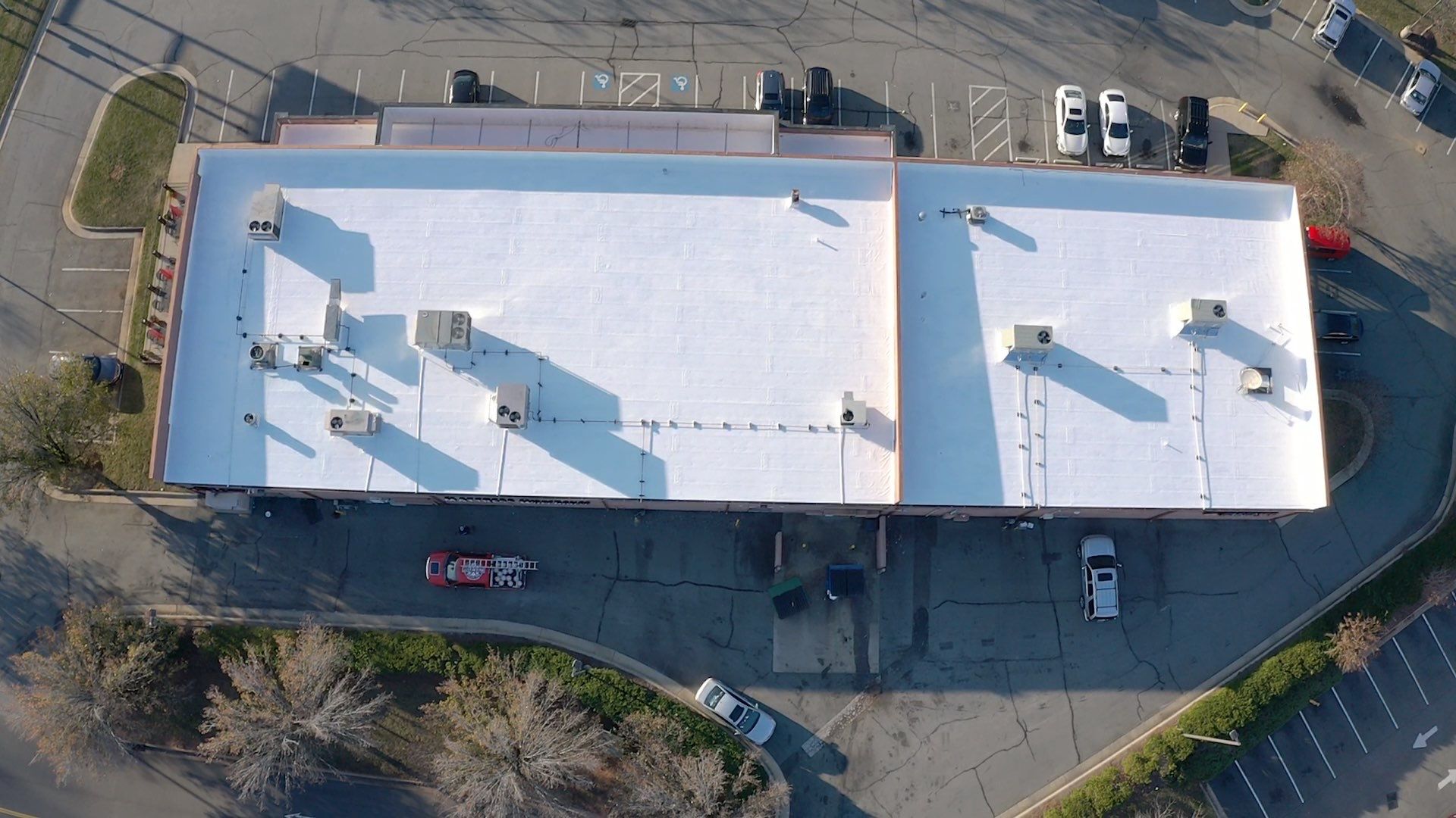Commercial Coating using Poly Urerthane and Silicone Coating by Just In Time Roofing and Restoration
