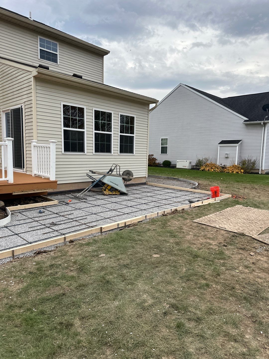 Oxford Slate stamped concrete patio  by NG Masonry & Construction LLC
