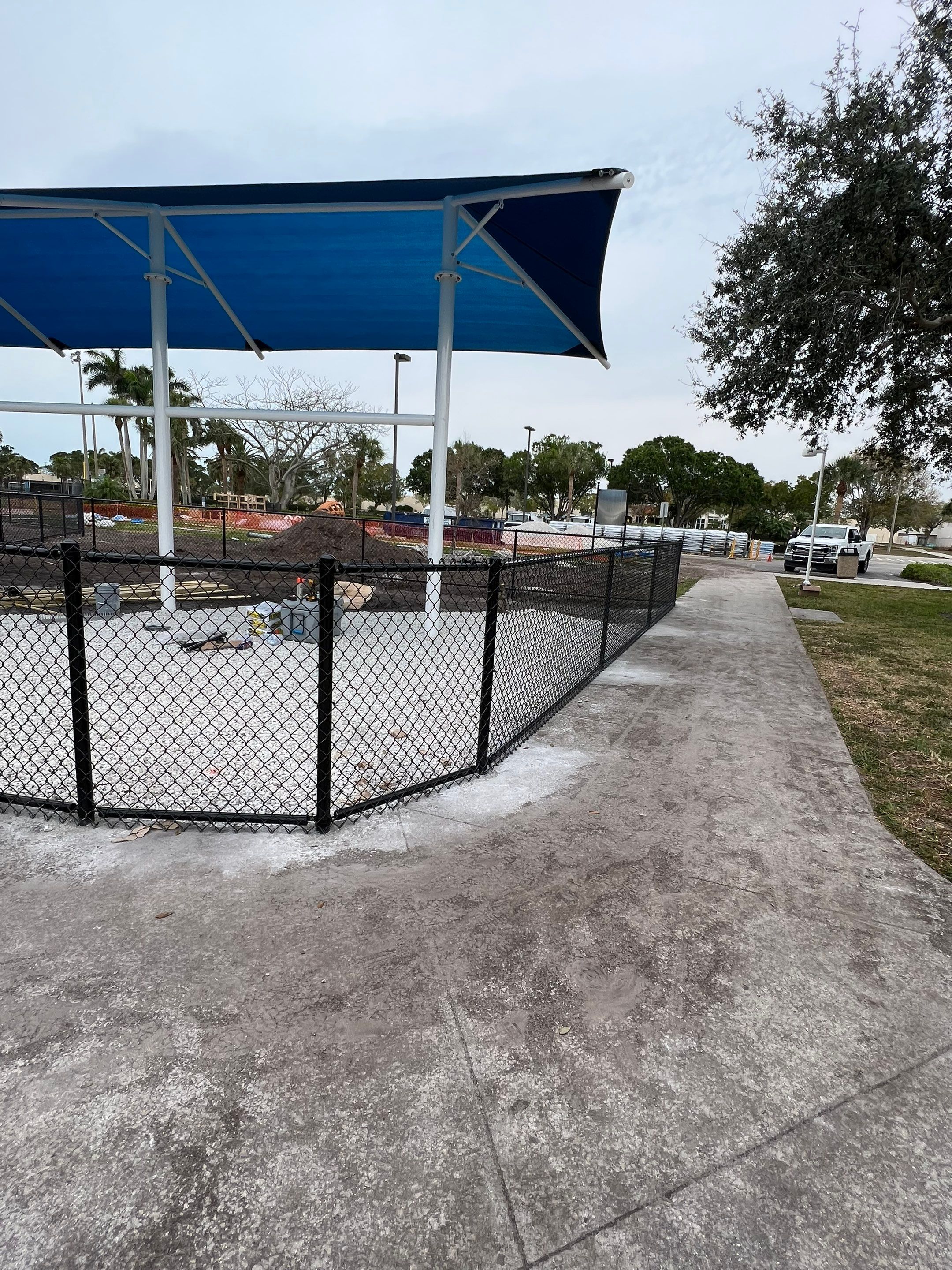 Vinyl Coated Chain-link fence for the City of Naples around Fleischmann Park Playground.  by Asap fence and gates, LLC