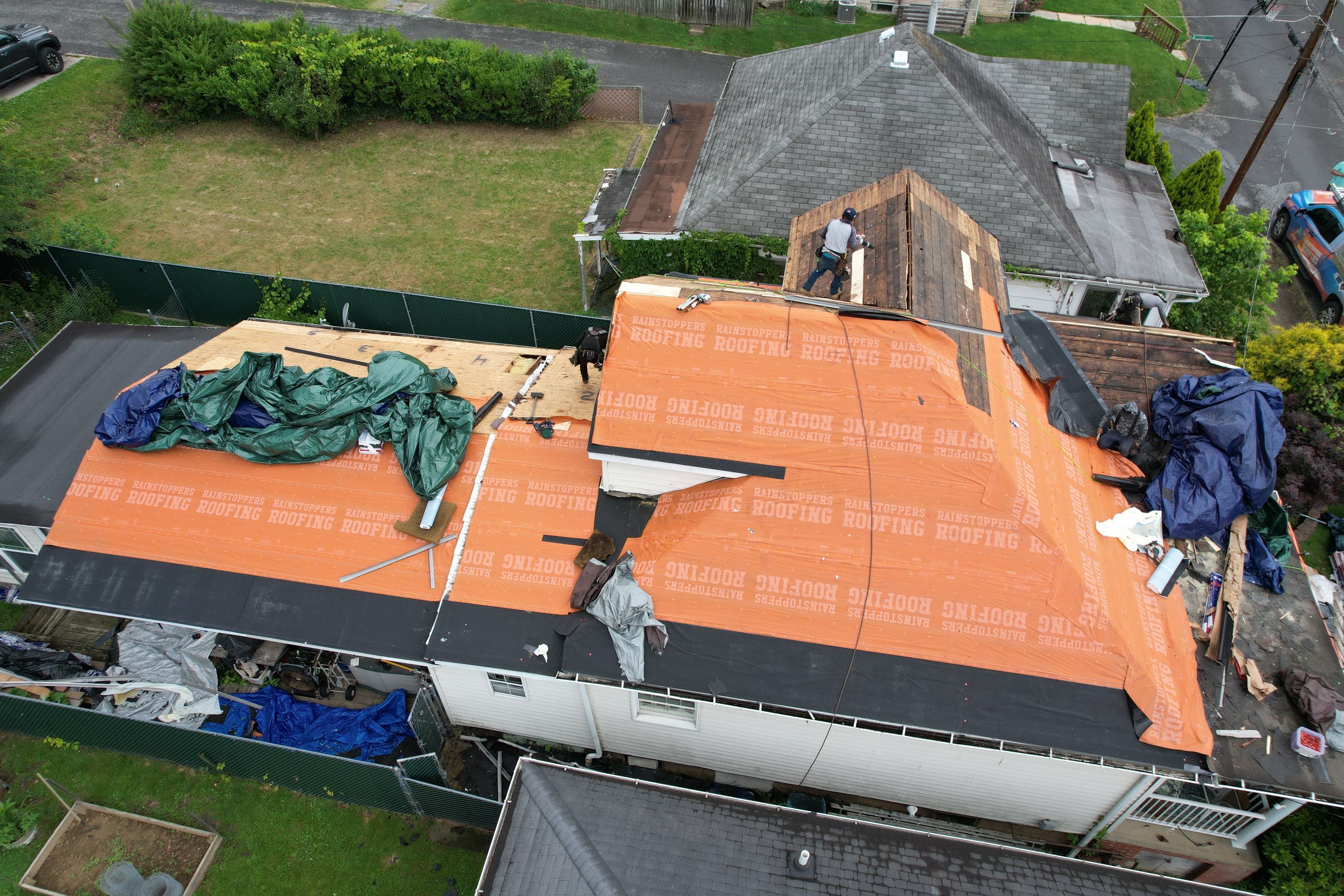 Residential Roofing Installation using GAF Timberline HDZ Charcoal by Rainstoppers Roofing