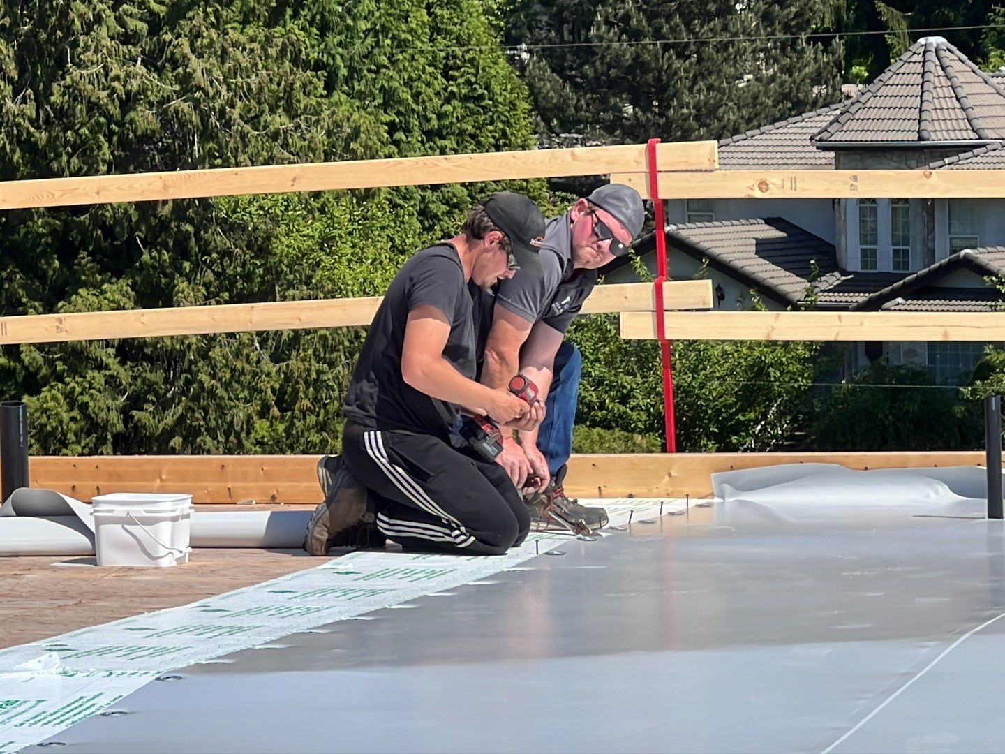 Residential Roofing Installation using Durolast roofing membrane by Top Notch Roofing Inc