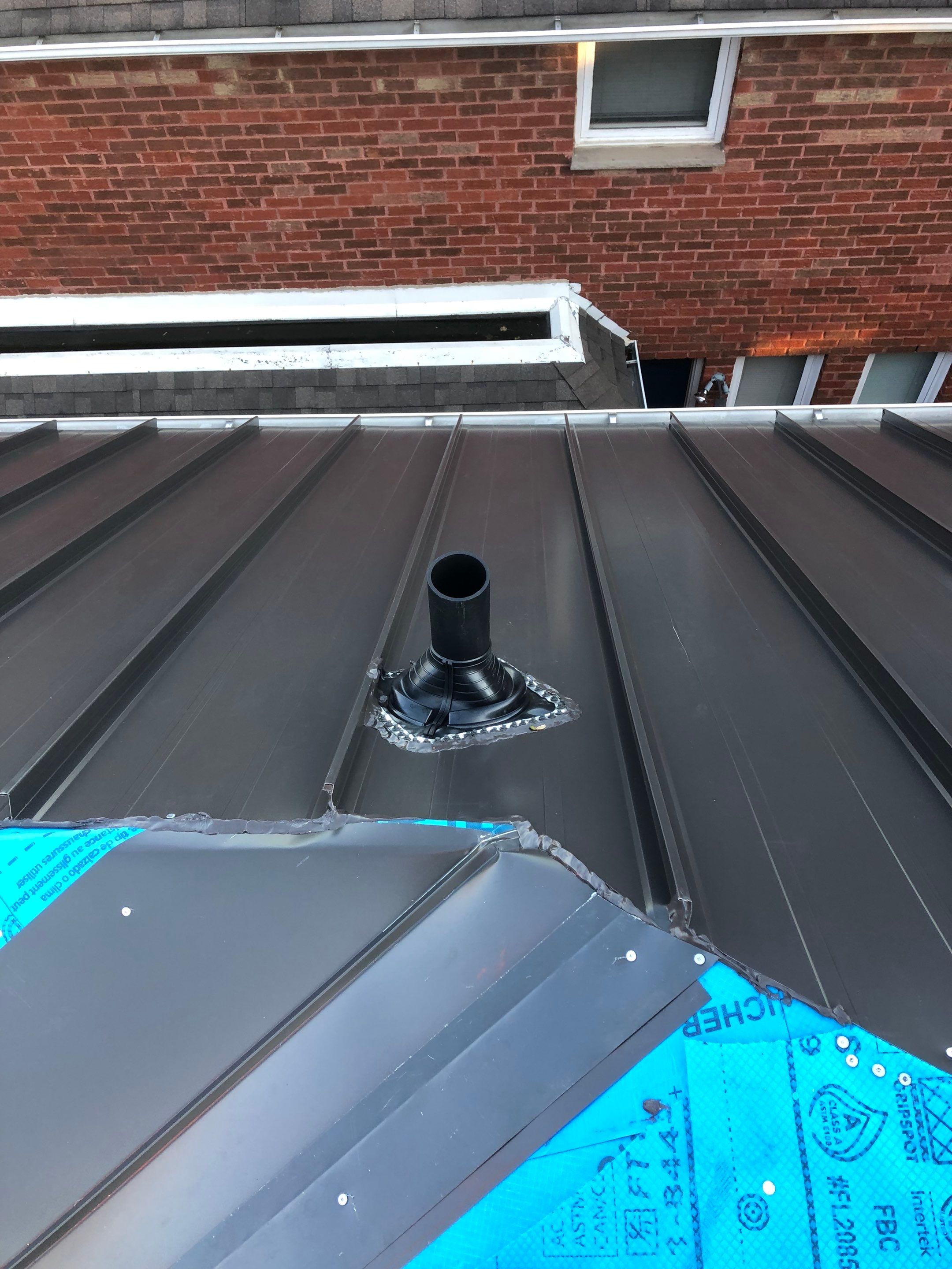 Residential Roofing Installation using 16" Standing Seam Panels by Jay Carter Roofing & Sheet Metal